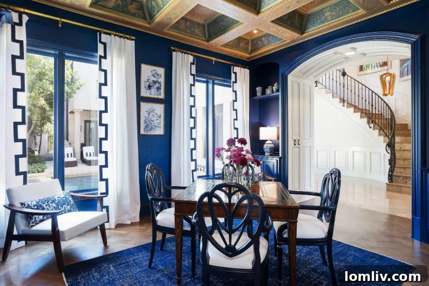 An opulent interior space featuring beautifully preserved original wood floors and a contemporary Swarovski crystal chandelier.