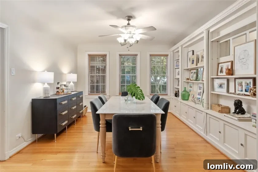 Interior view of a living space in the Highland Park triplex, featuring exposed wood beams and architectural details