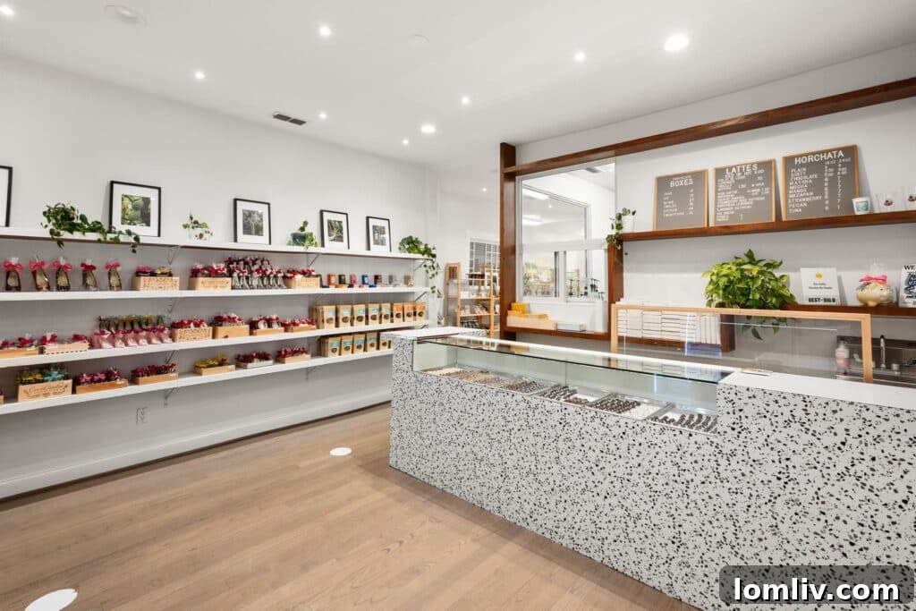 Interior shot of CocoAndre, showcasing delicate chocolates and elegant displays, highlighting the craft and aesthetic.