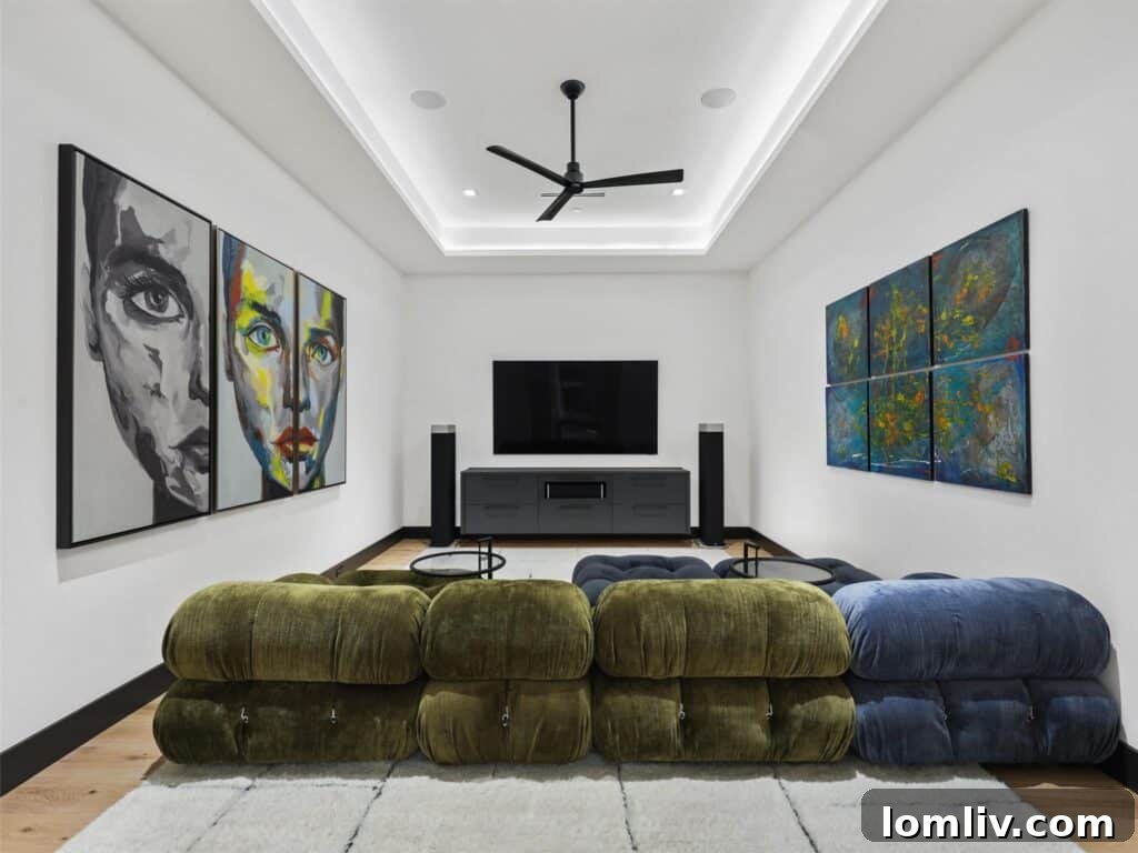 Westlake's Quail Hollow: Redefining Modern Luxury 19 Another perspective of the media room, highlighting its comfortable seating and modern design.