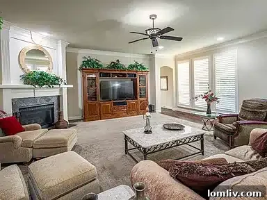 French doors opening from a primary bedroom to a lush green backyard, offering privacy and a connection to nature.