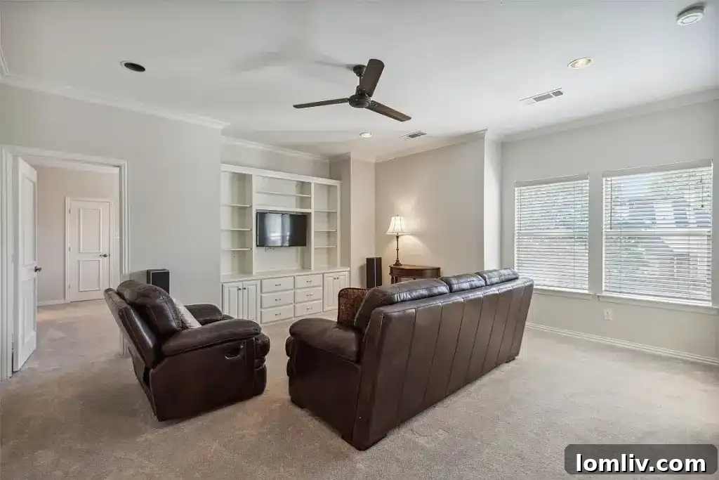 Elegant primary bathroom with dual vanities and a large walk-in shower.