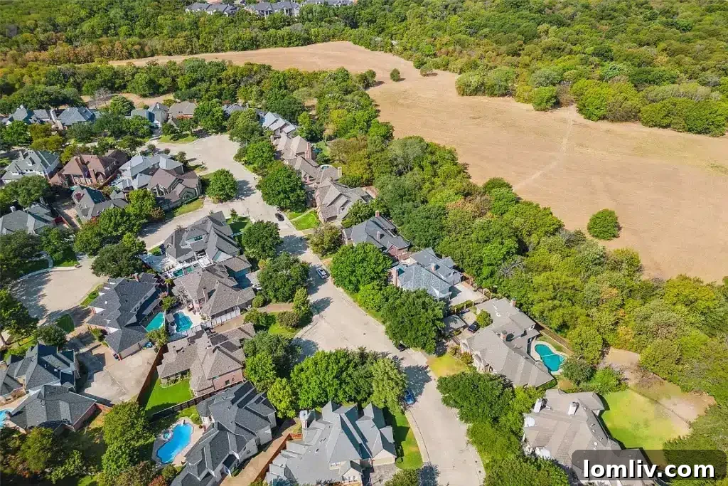 Beautiful backyard with a swimming pool and manicured lawn.