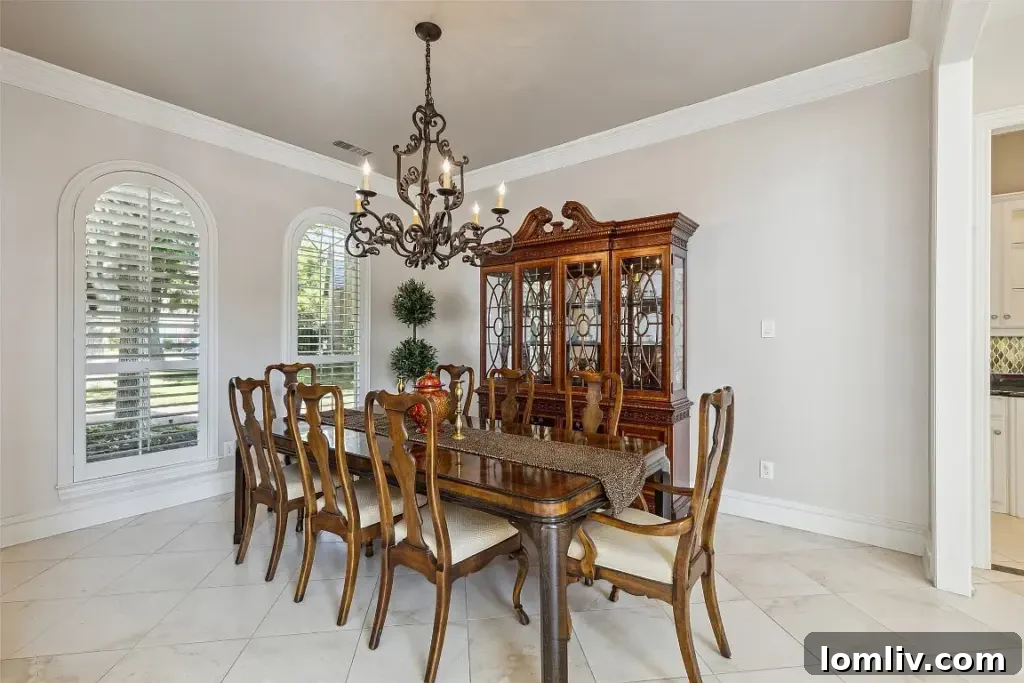 Dining area with large windows and a view of the outdoors.