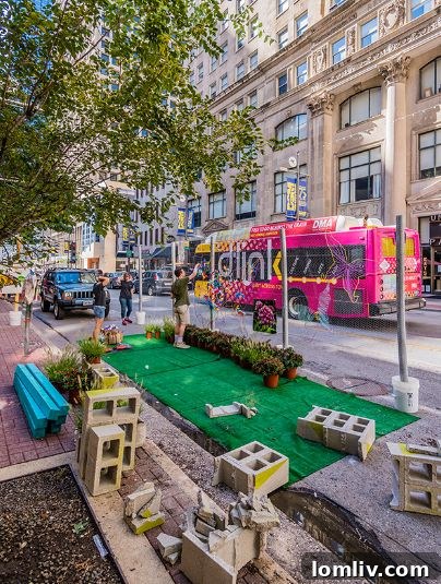 Park(ing) Day event in downtown Dallas, showcasing creative transformation of parking spaces into community parklets.