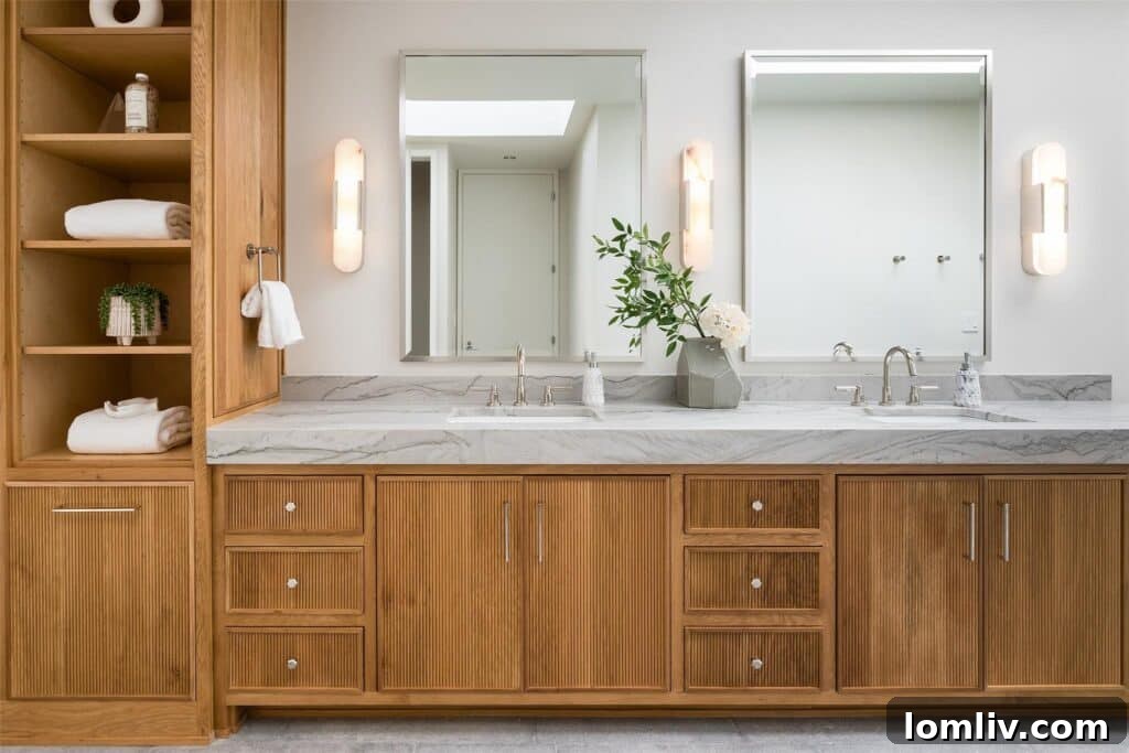 Gracefully arched entry leading into a lavish wet room in the primary bathroom, creating a spa-like atmosphere.
