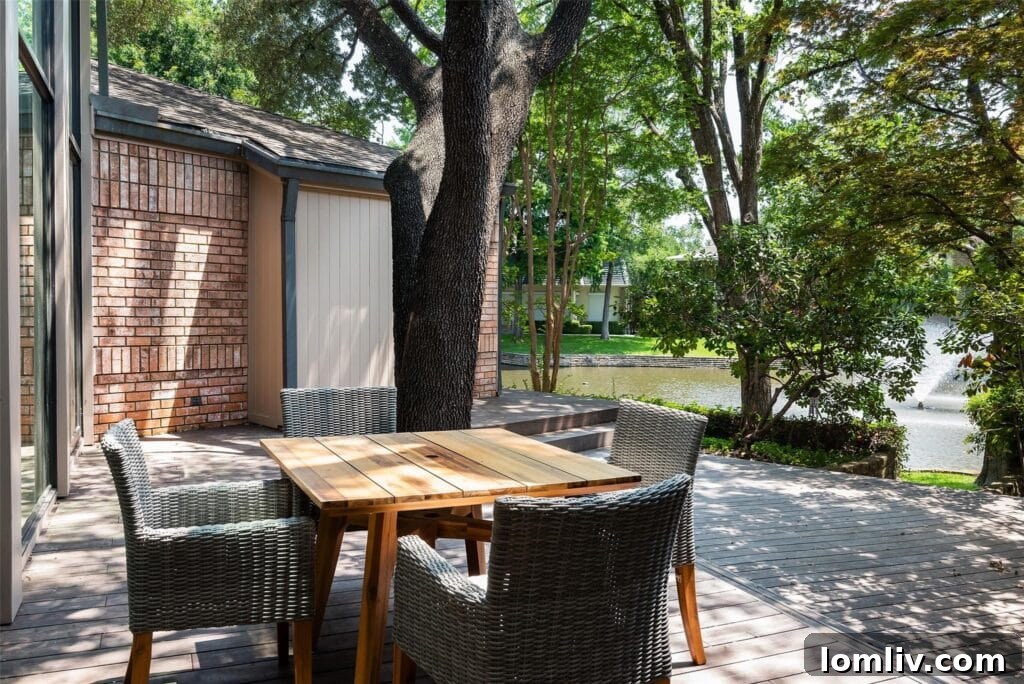 Sustainable bamboo-slatted deck system overlooking the private lake, offering an elegant and eco-friendly outdoor living space.