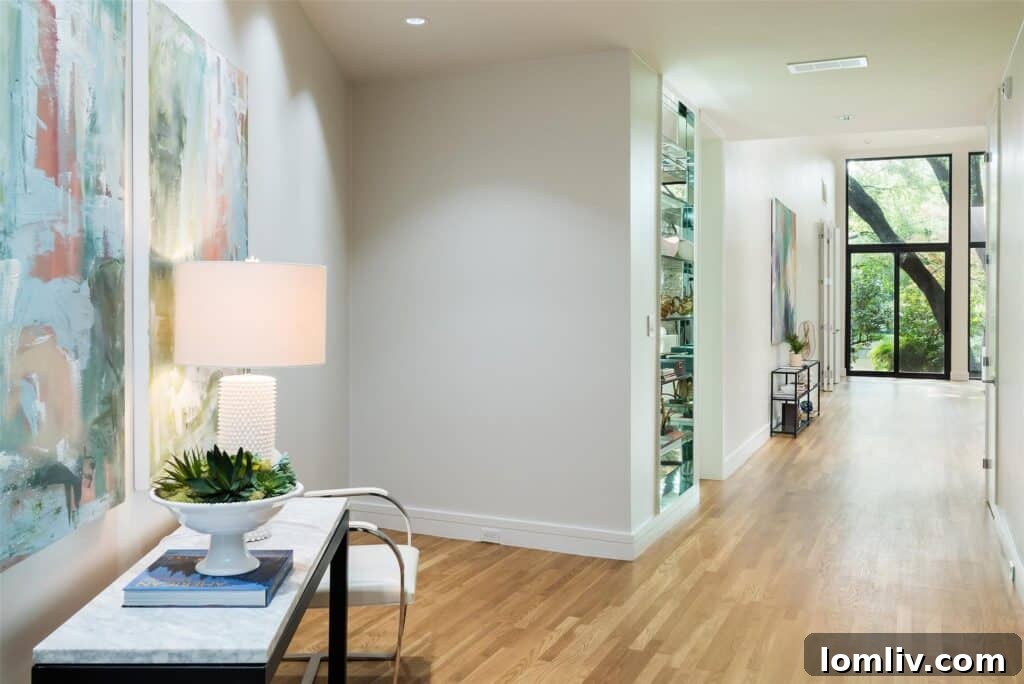 Elegant living area featuring minimalist decor, polished Level 5 wall finishes, and bespoke architectural details.