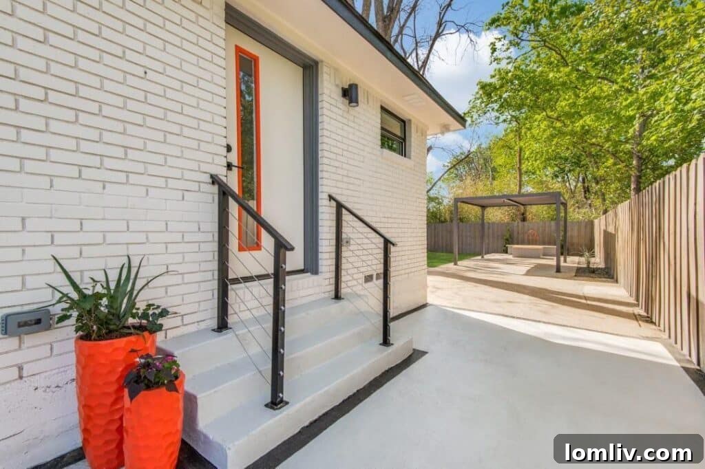 Exterior close-up of a modern home, highlighting architectural details and landscaping in South Dallas.