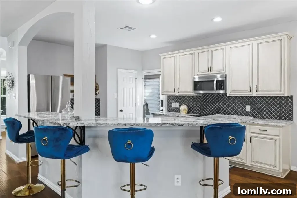 Angled kitchen bar offering casual dining space in a McKinney family home.