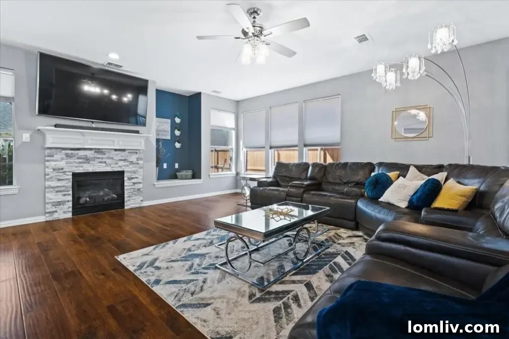 Family room in a McKinney home, filled with natural light from large windows.