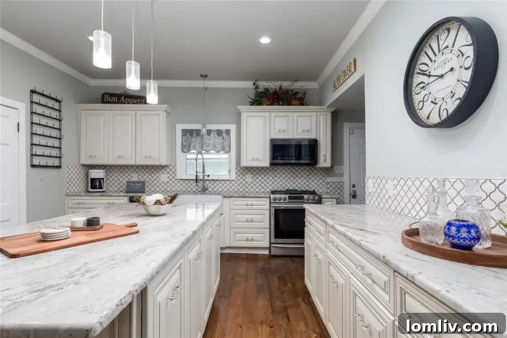 Bright, white kitchen with stainless steel appliances and custom cabinets in a McKinney historic home.