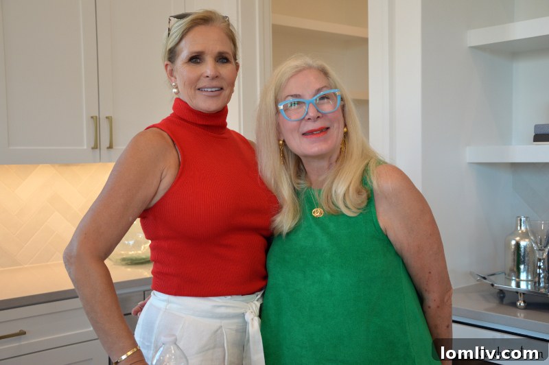 Carla Johnson and Publisher Candy Evans at daltxrealestate.com event on Sept. 6.