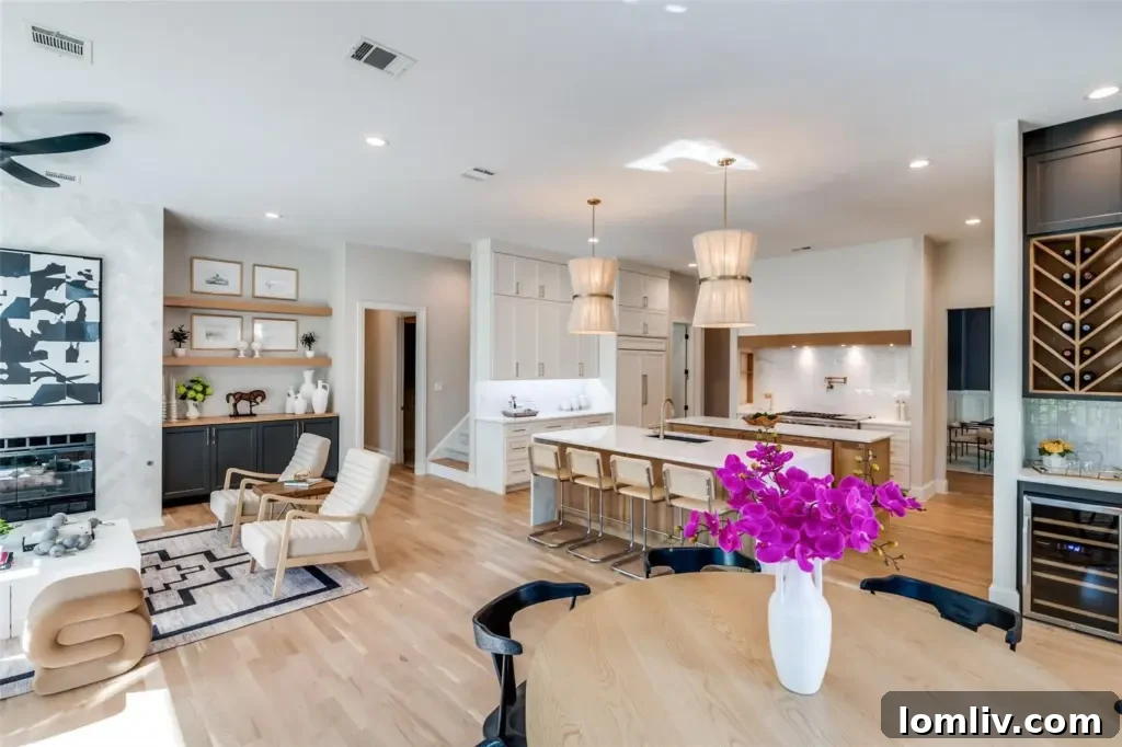 Elegant wet bar with wine fridge and decorative storage, ideal for entertaining in a luxury home