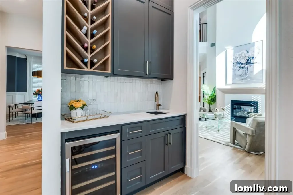 Discreet prep kitchen offering additional workspace and storage, enhancing the main kitchen's functionality