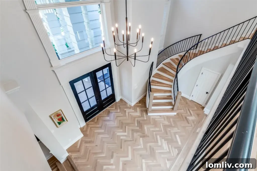 Elegant interior corridor showcasing architectural details and modern design in a renovated Timarron house