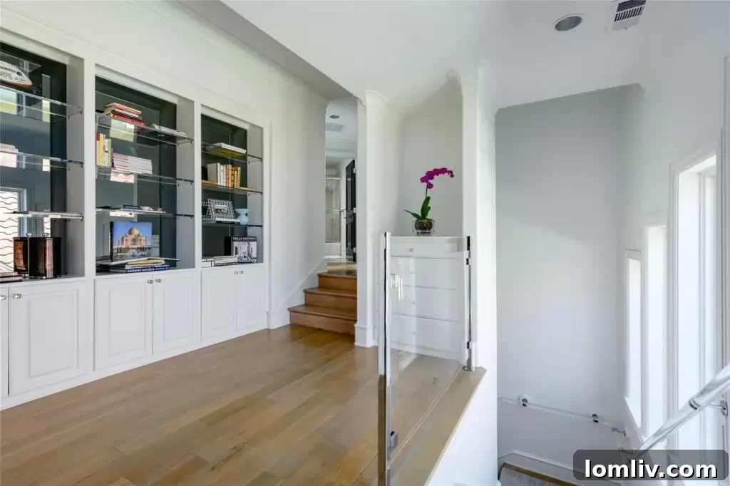 Home office with a large desk and a built-in fish tank