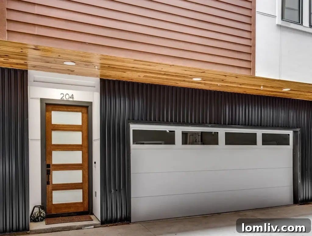 Modern kitchen with stainless steel appliances and quartz countertops