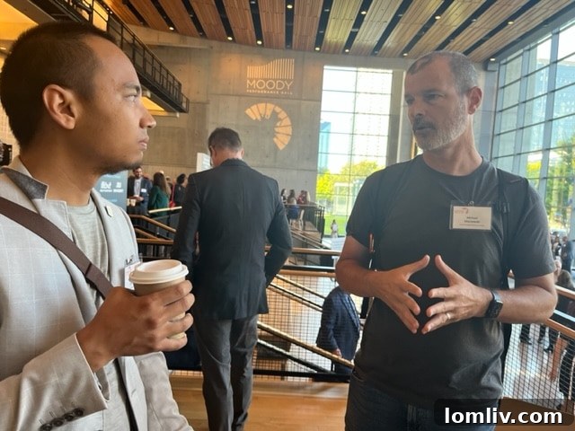 Hexel Colorado and Michael Sitarzewski networking at the 'State of Downtown' event.