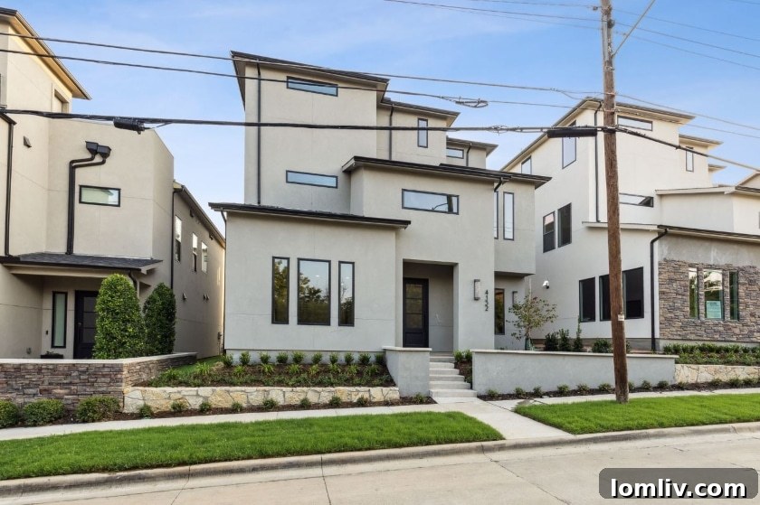 The impressive facade of 4132 Entrada Way, a 3,403 sq ft luxury home at Skyline Terrace Villas, listed for $1.24 million, showcasing modern design elements.
