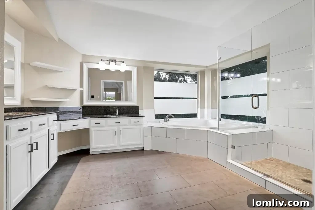 Luxurious master bathroom with garden tub and separate shower at 935 Crown Court