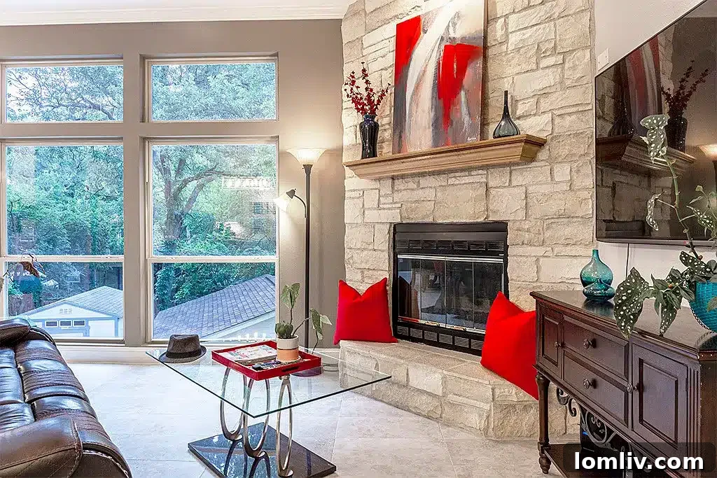 Spacious living room with large windows overlooking natural landscape at 218 Scenic Drive