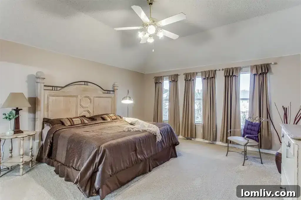 Spacious master bedroom with abundant natural light at 3223 Newhaven Drive