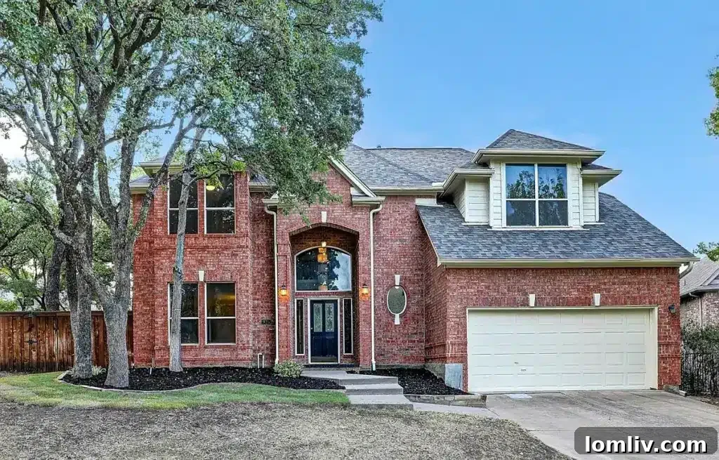 Charming two-story home exterior at 935 Crown Court, Highland Village