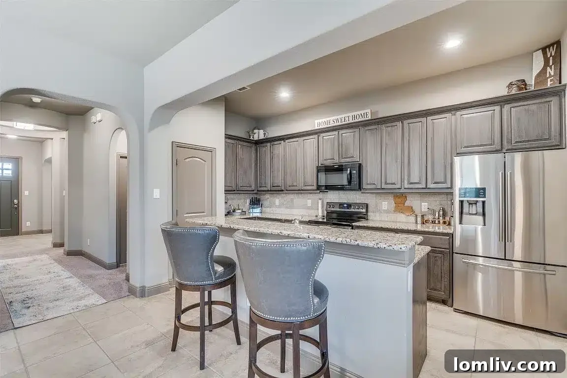 Kitchen with Stainless Steel Appliances and Breakfast Bar