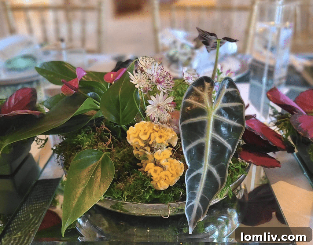 Claire Rathbun meticulously working on a fresh floral arrangement in her studio.
