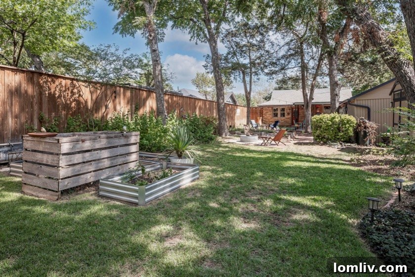 Three Words, Timeless Charm: This Hampton Hills Tudor Sold Instantly 10 Lush greenery in the backyard