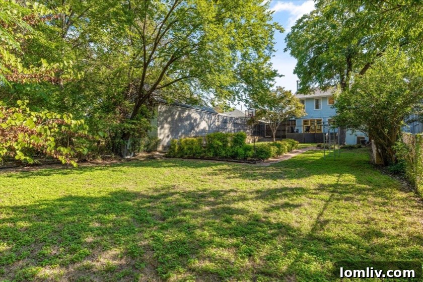 Another perspective of the inviting front porch, emphasizing its role as a welcoming space for relaxation and social interaction within the Kings Highway neighborhood.