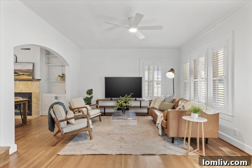 A serene street view showcasing the mature trees and well-maintained homes characteristic of Kings Highway in Oak Cliff, highlighting the area's preserved historical charm.