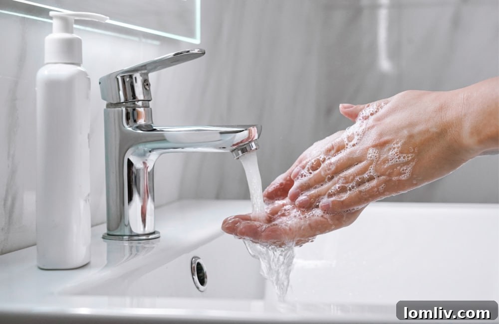A pristine, well-lit bathroom sink, symbolizing cleanliness and luxury, ideal for celebrating Global Handwashing Day.