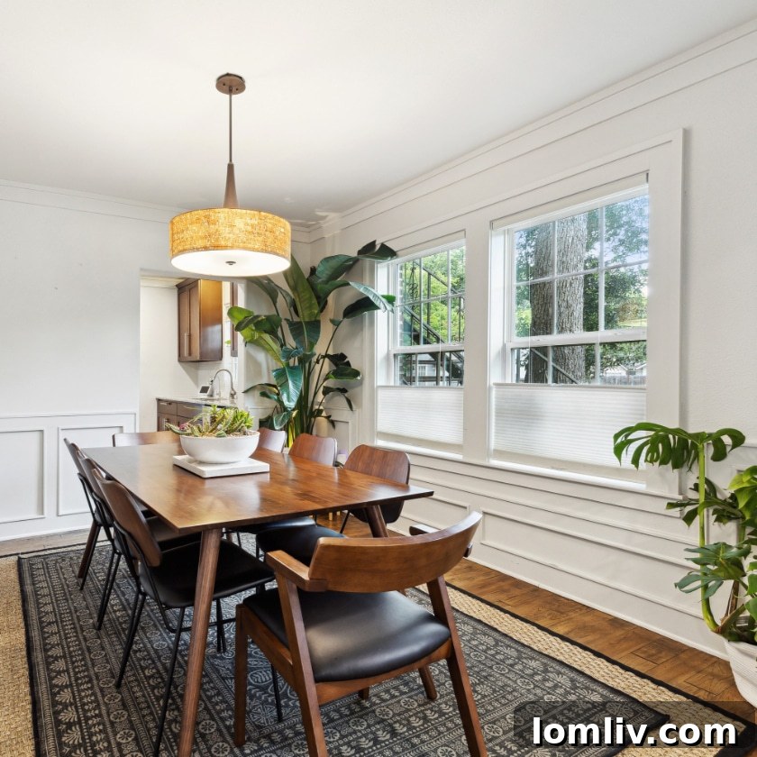 A stylish dining area in the Montreal Avenue home, featuring elegant Danish furniture, set for a refined gathering.