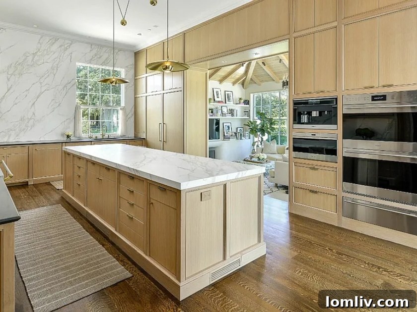 A serene view of the backyard and pool area of 3616 Crescent Avenue, showcasing elegant outdoor living spaces.