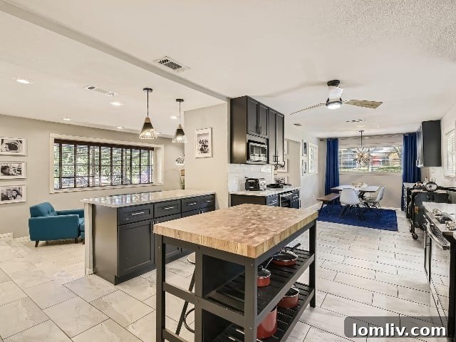 Ridgmar's Split-Level Home: The Enduring Appeal of Smart Design 4 Stairs leading to an open living area with kitchen and dining space.