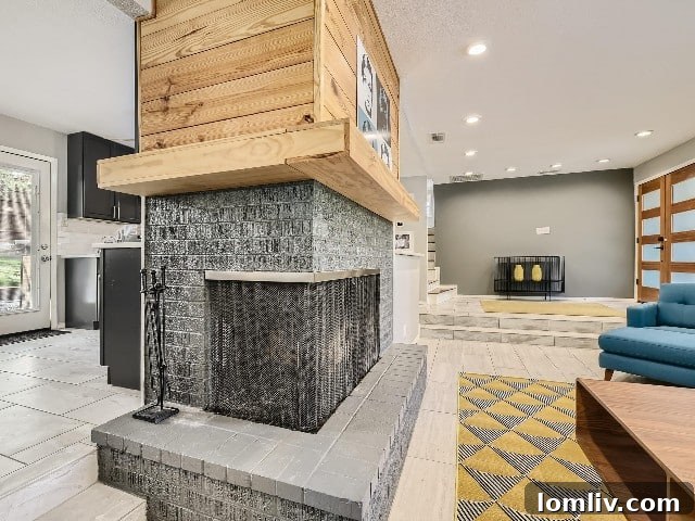 Ridgmar's Split-Level Home: The Enduring Appeal of Smart Design 5 Wrap-around fireplace giving a Midcentury Modern feel.