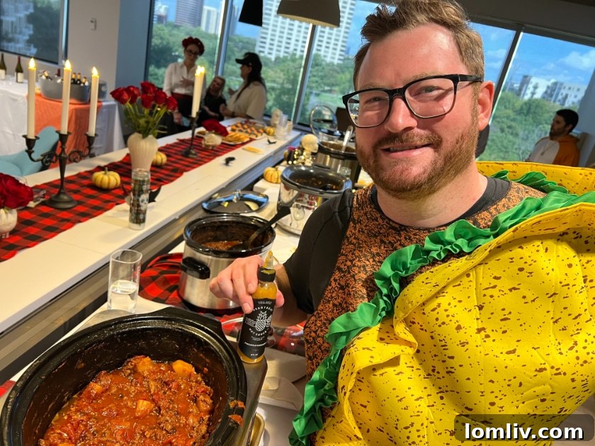 Patrick Bukowitz, Briggs Freeman Sotheby’s International Realty agent, winning the People's Choice award with his pineapple chili.
