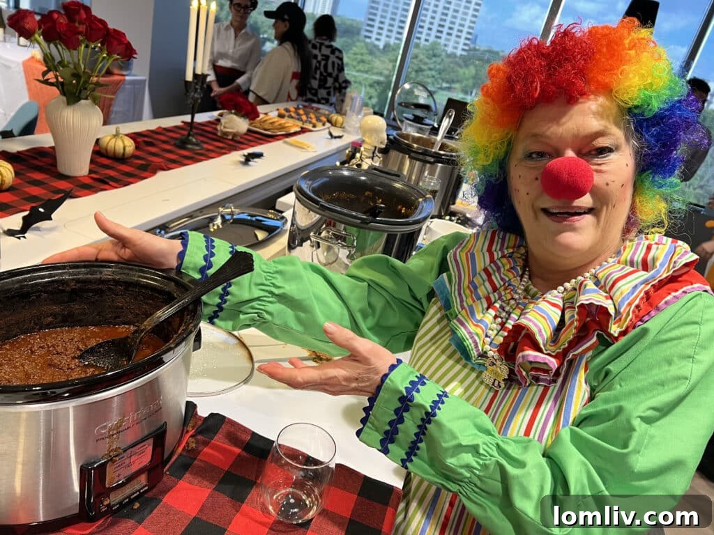 Laura Abbott, office coordinator for the Lakewood office, winning the best-costume award.