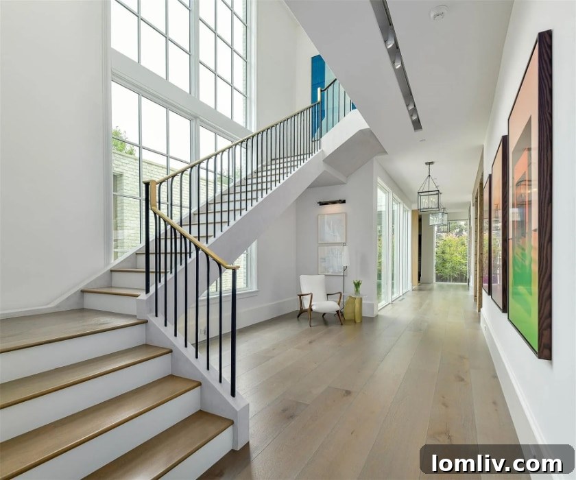 European soft contemporary home exterior with modern landscaping