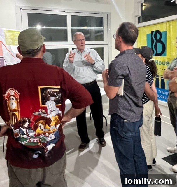 Consultant Philip Neeley engages with East Dallas residents at a public meeting discussing the White Rock Lake Master Plan.