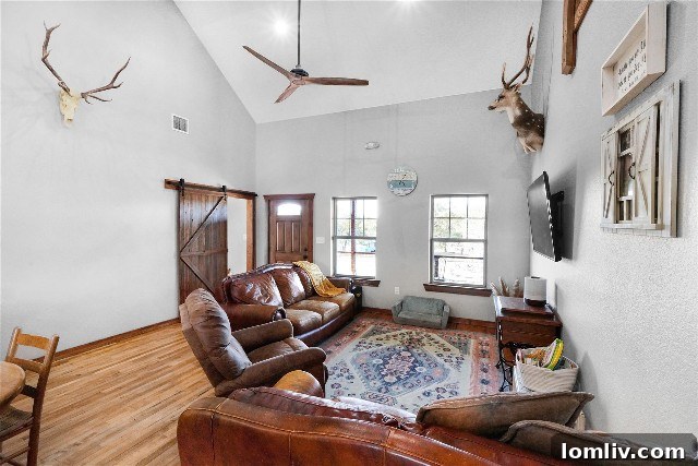 Lone Camp General Store: Your Ultimate Live, Work, Play, Community Lifestyle 13 Living area of the upstairs quarters with reclaimed Maple wood flooring