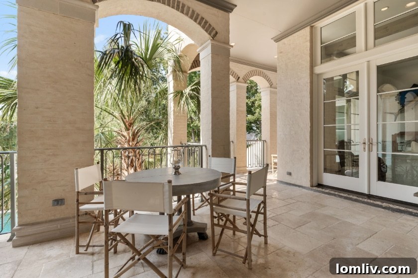 Aerial View of Luxury Home with Pool and Lakefront Access