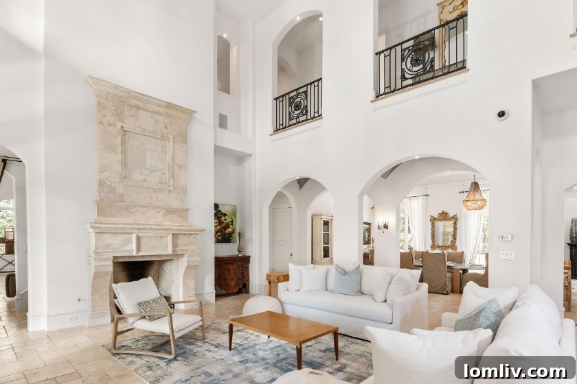 Luxurious Living Room with Stone Fireplace and Lake Views