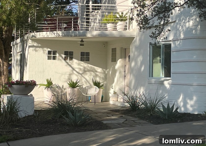 The rejuvenated Streamline Moderne home at 1302 Cedar Hill, now restored to its original splendor.