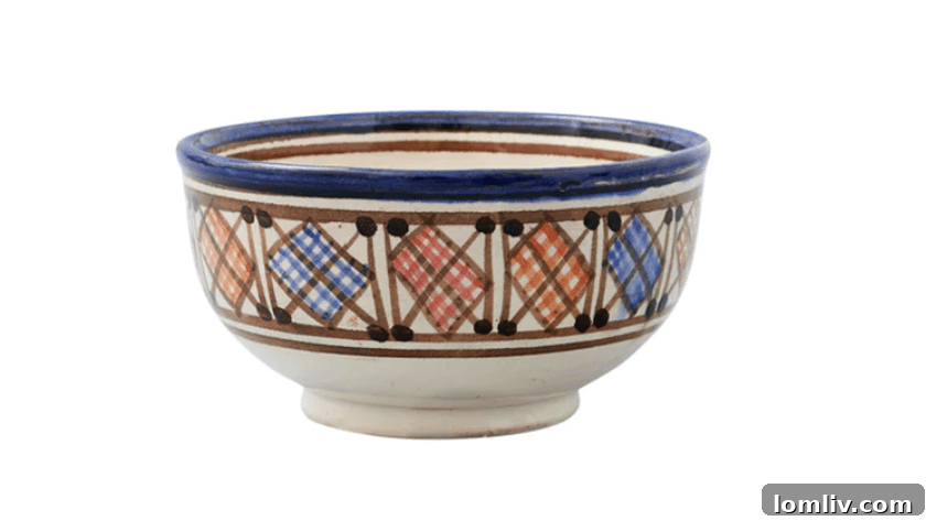 Hand-painted ceramic Moroccan nut bowls with geometric shapes, adding festive flair to any table.