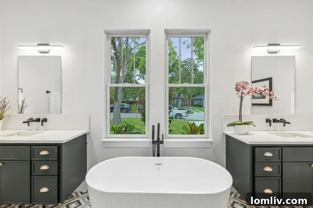 One of the comfortable upstairs bedrooms, featuring ample natural light and modern finishes.