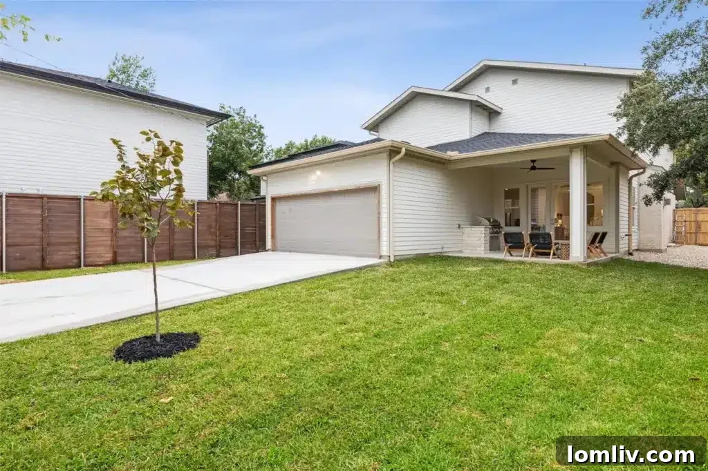 A picturesque street view in Belmont Addition, showcasing a blend of traditional and modern homes under mature trees.
