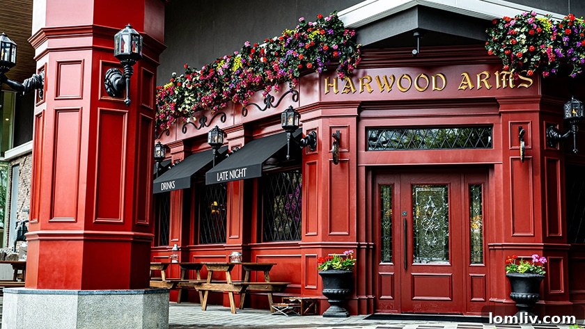 A festive cocktail with a Santa tumbler and holiday decor at Harwood Arms.
